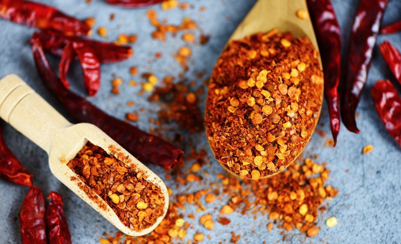 chili flakes on spoon