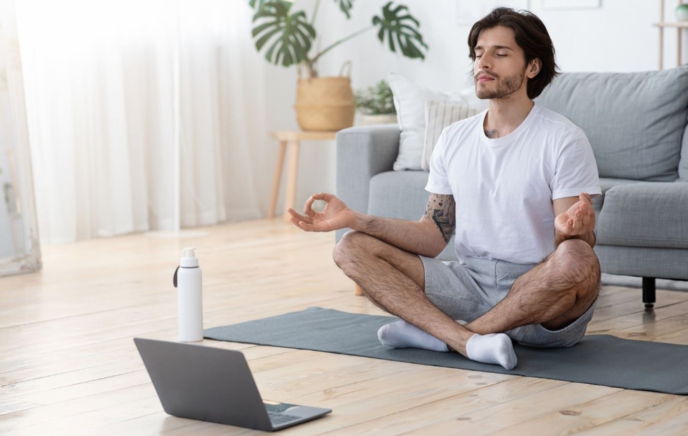 man doing yoga