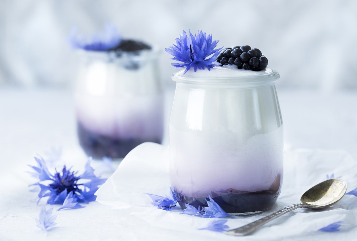 yogurt in glass jar with berry
