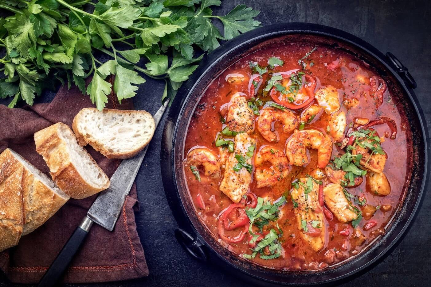 pot of gumbo and bread