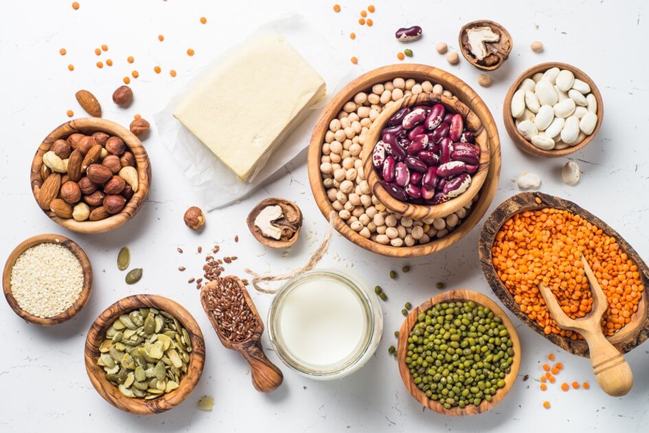 bowls of seeds and nuts on a table