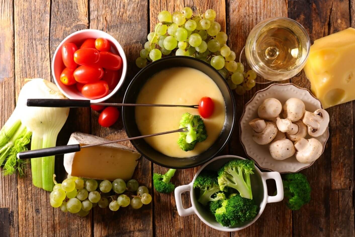 fondue pot with grapes and veggies