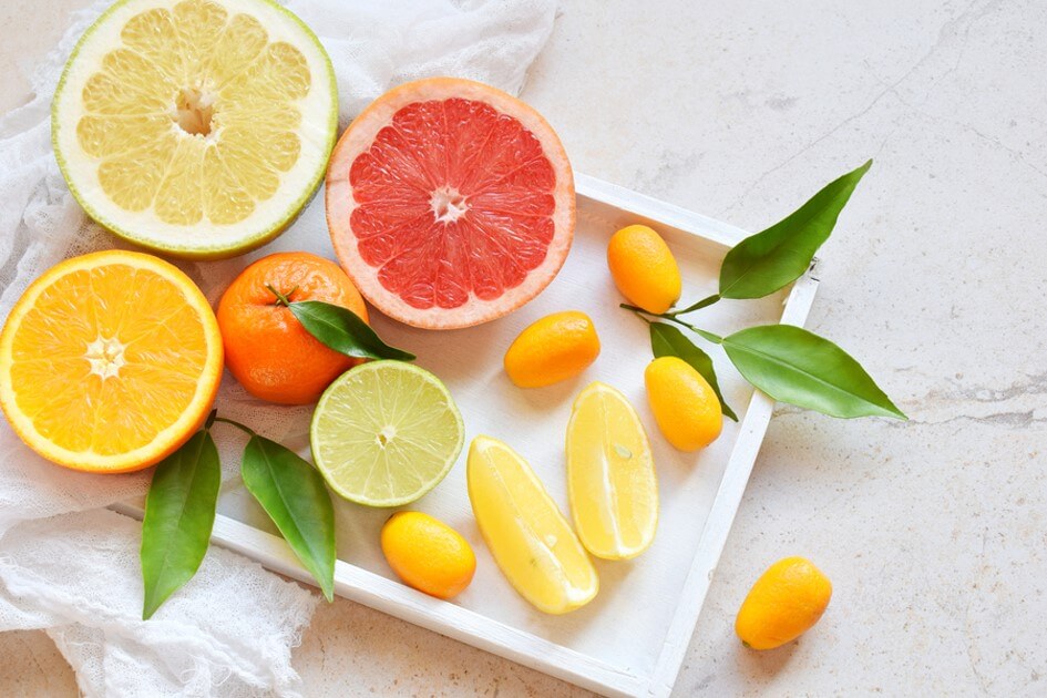 slices of orange lime and grapefruit on plate