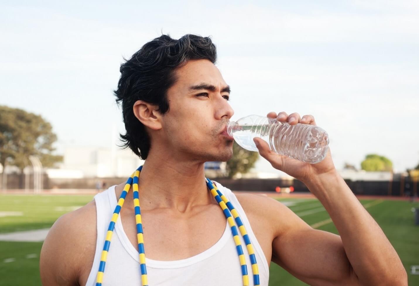 man drinking water