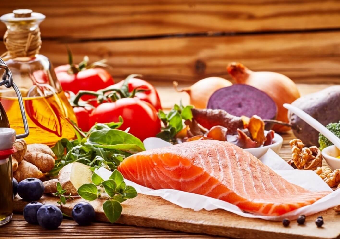 salmon and fruit on table