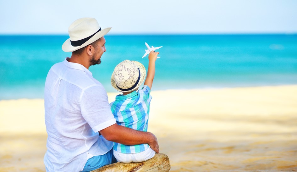 dad and son at beach