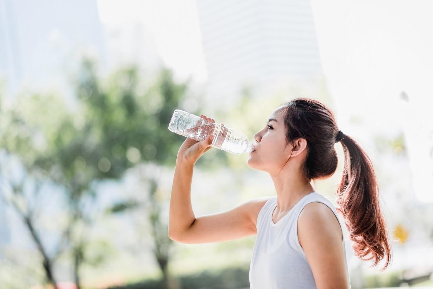 woman with water bottle