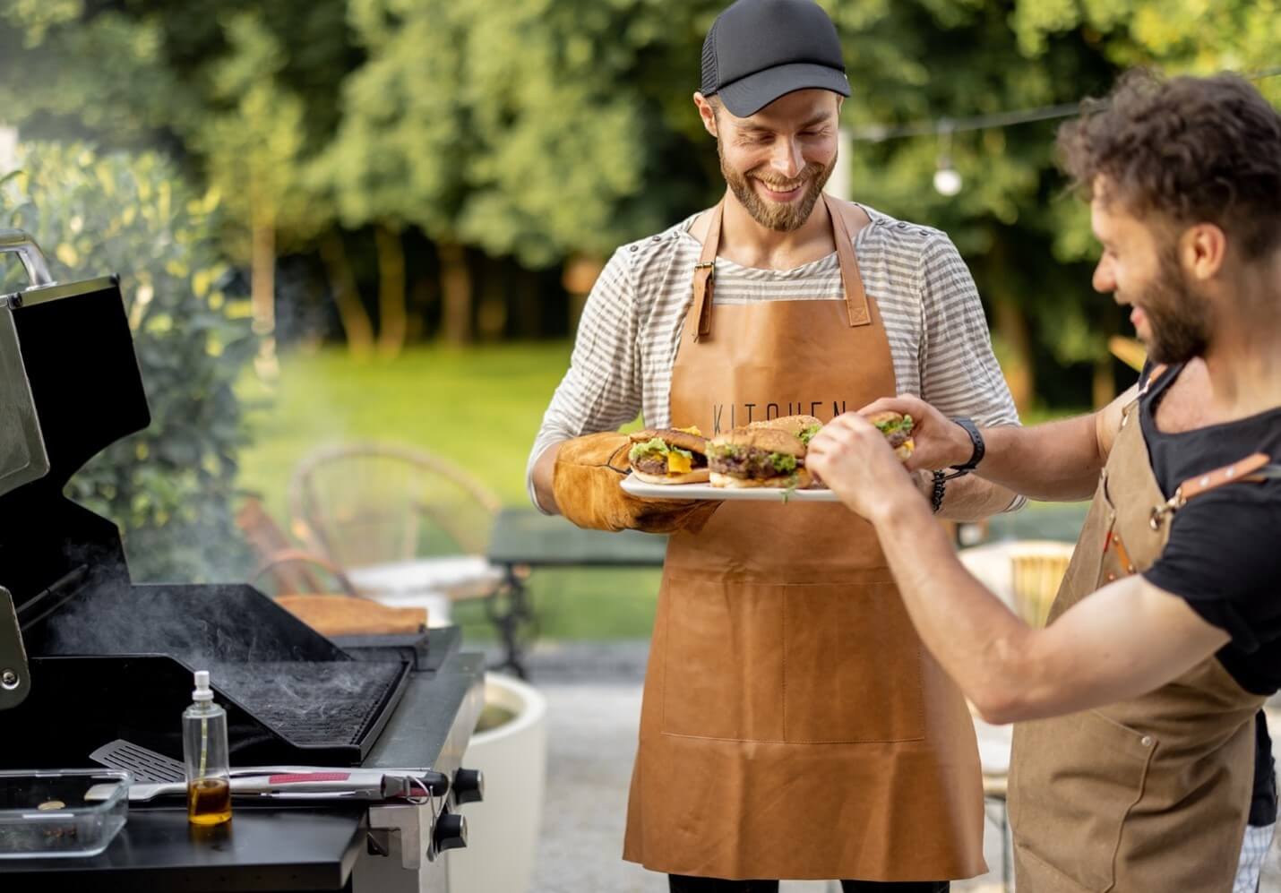 two men grilling