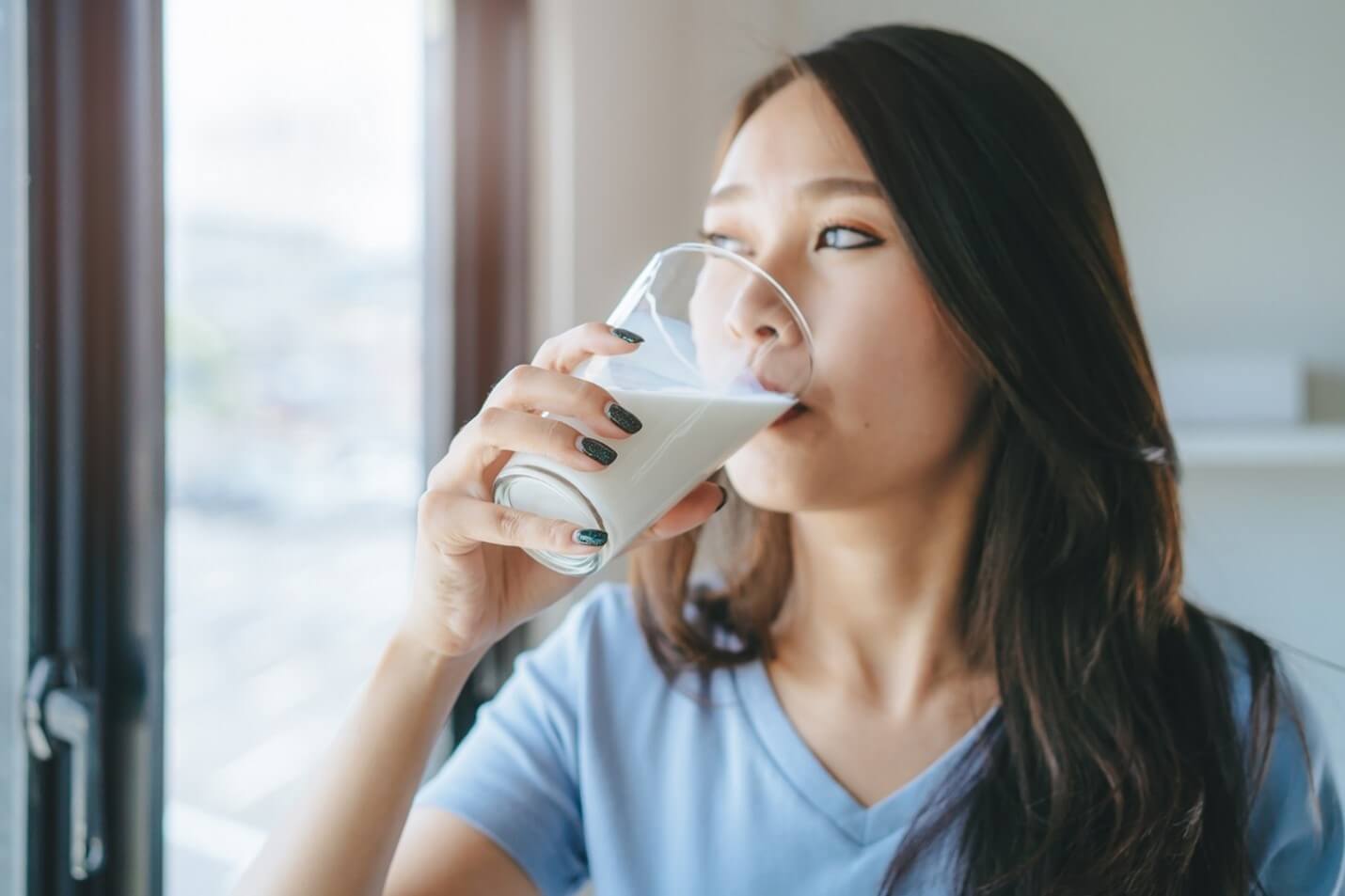 woman drinking milk