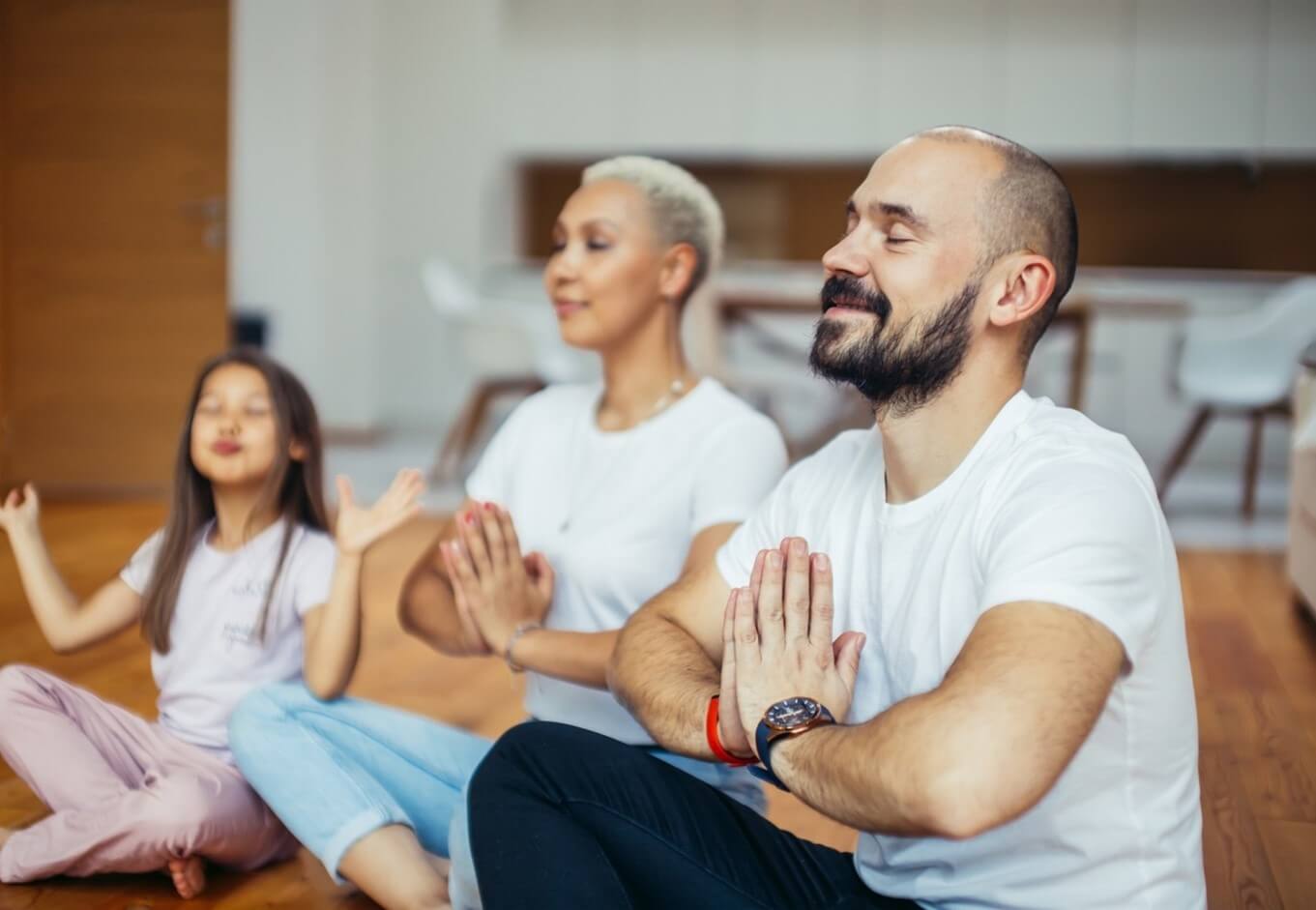 family doing yoga