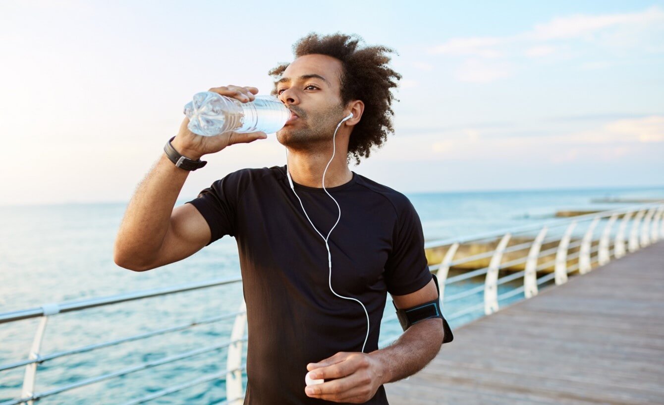 man drinking water