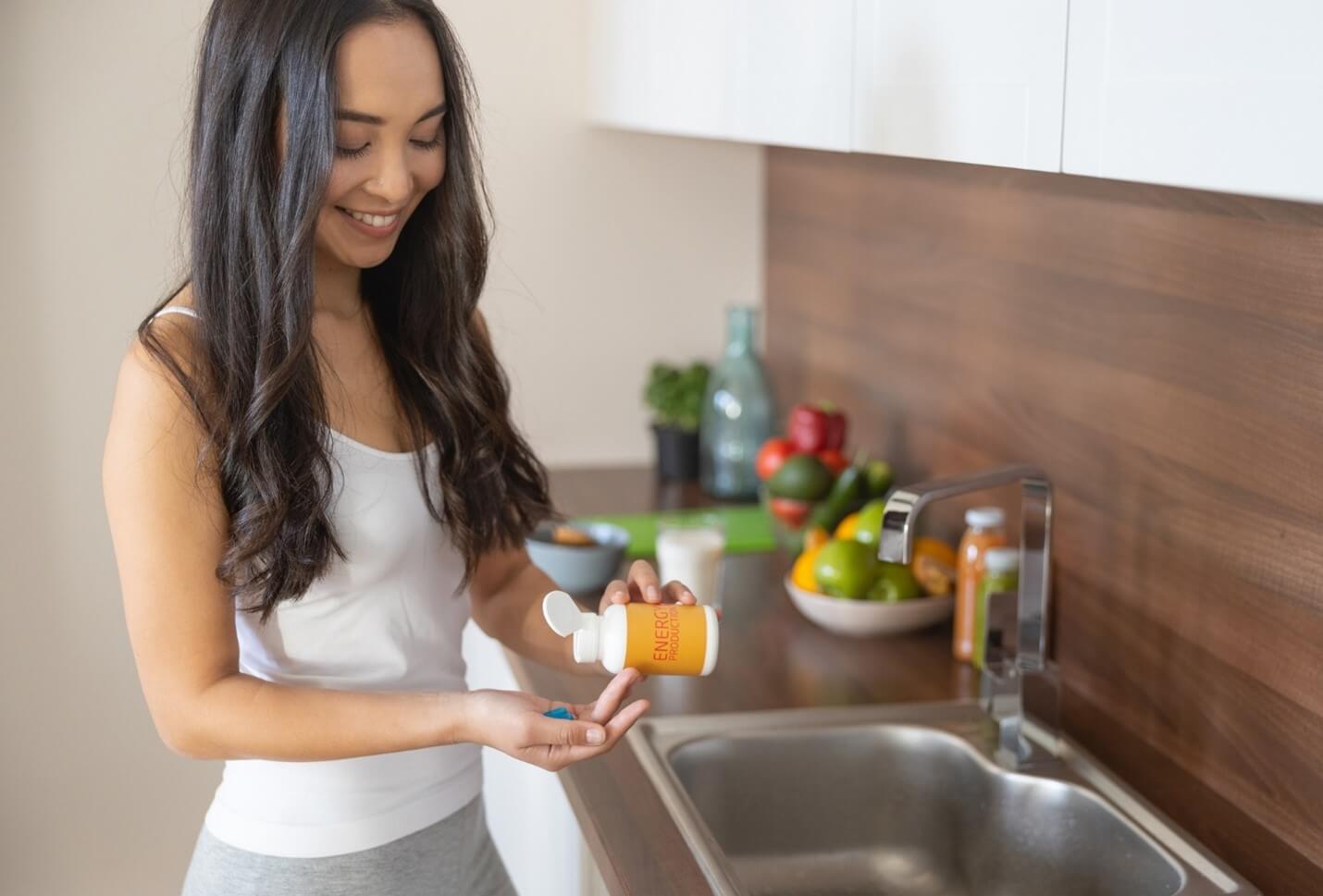 woman taking supplements