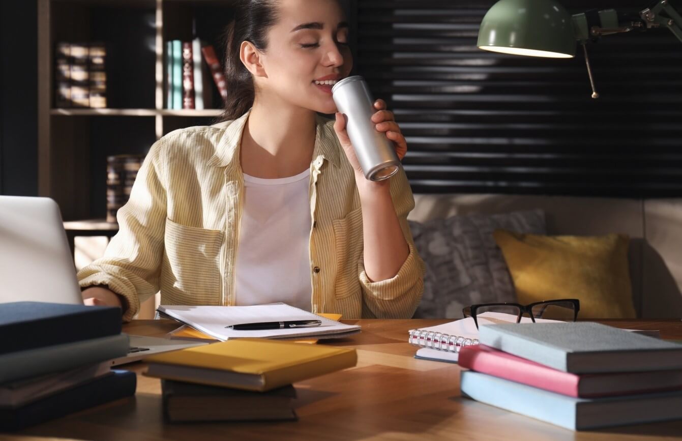 woman drinking beverage