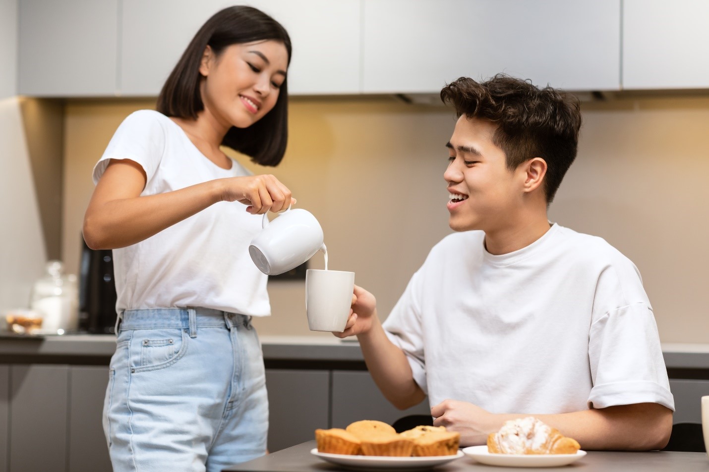 man and woman drinking tea