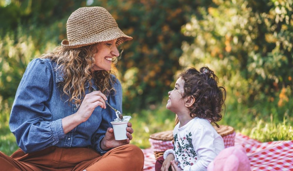 mom and child snacking