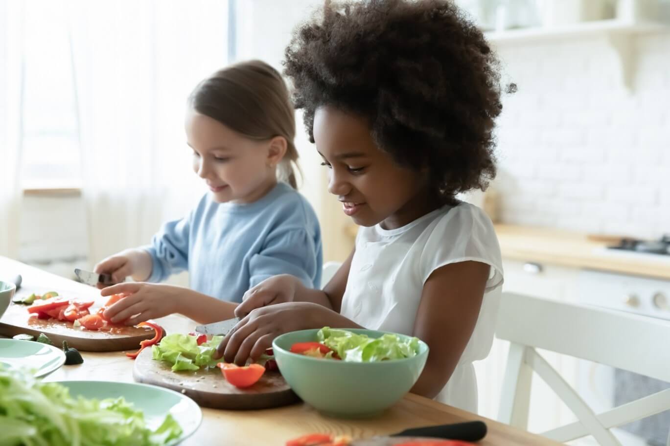 two kids cooking