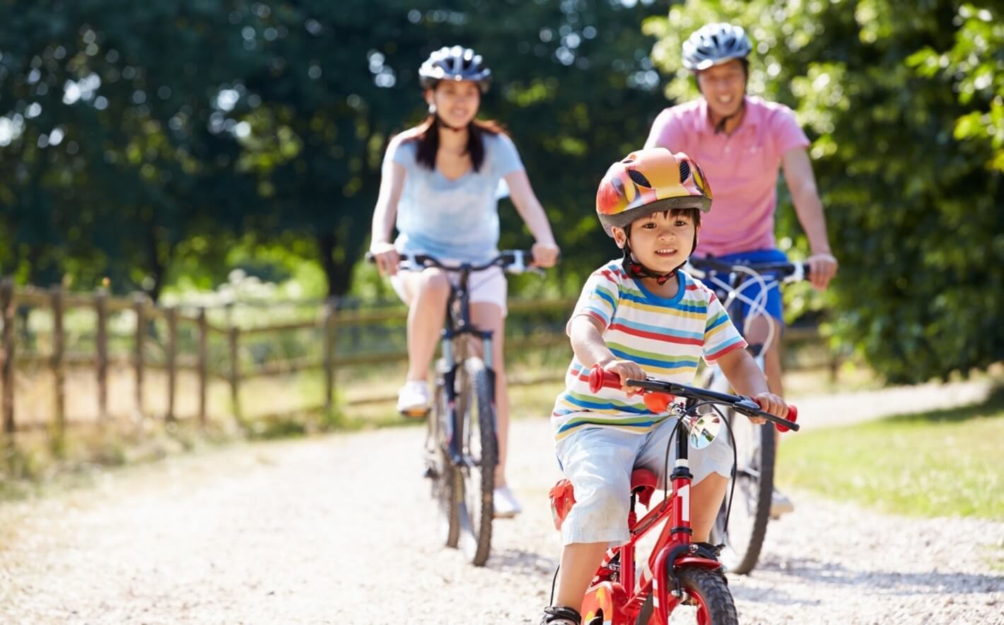 family riding bikes