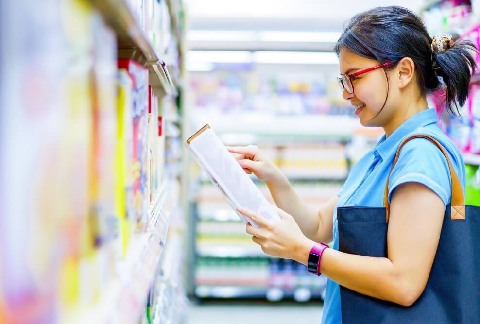 woman looking at cereal