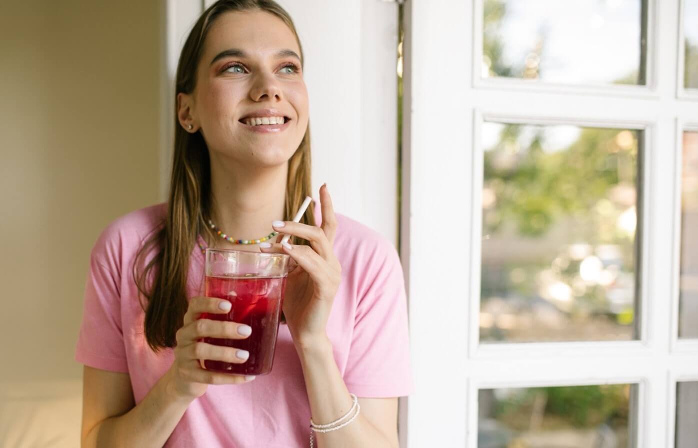 woman drinking flavored water