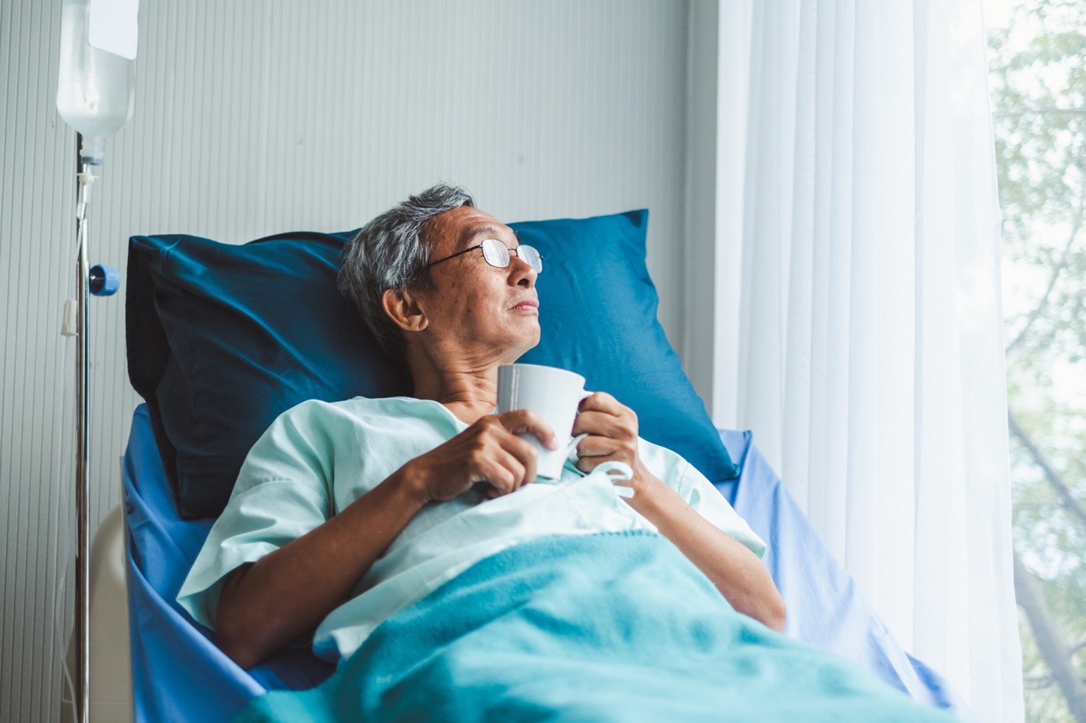 senior in hospital bed