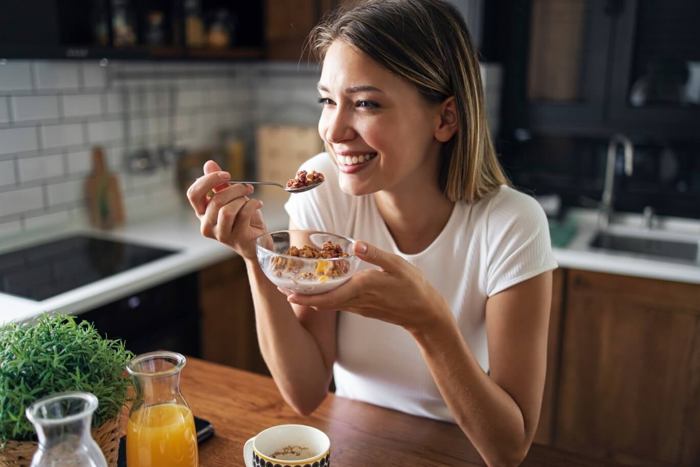 woman eating yogurt