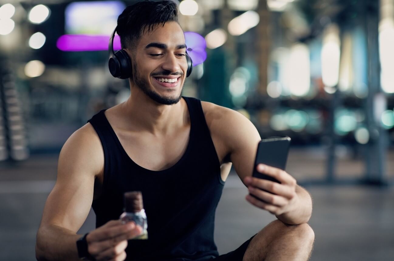 man at the gym on phone