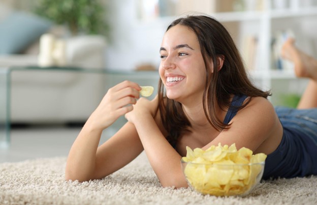 woman eating chips