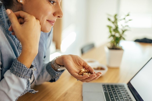 woman eating nuts