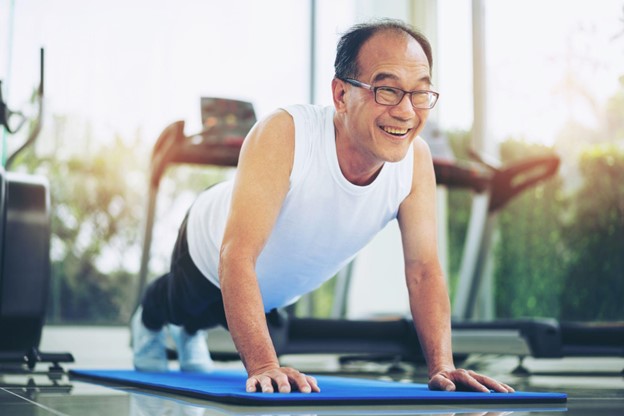 senior man doing yoga
