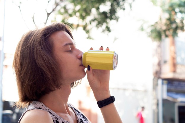 woman drinking beverage