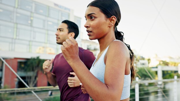 woman and man running