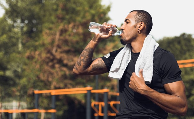 man drinking water