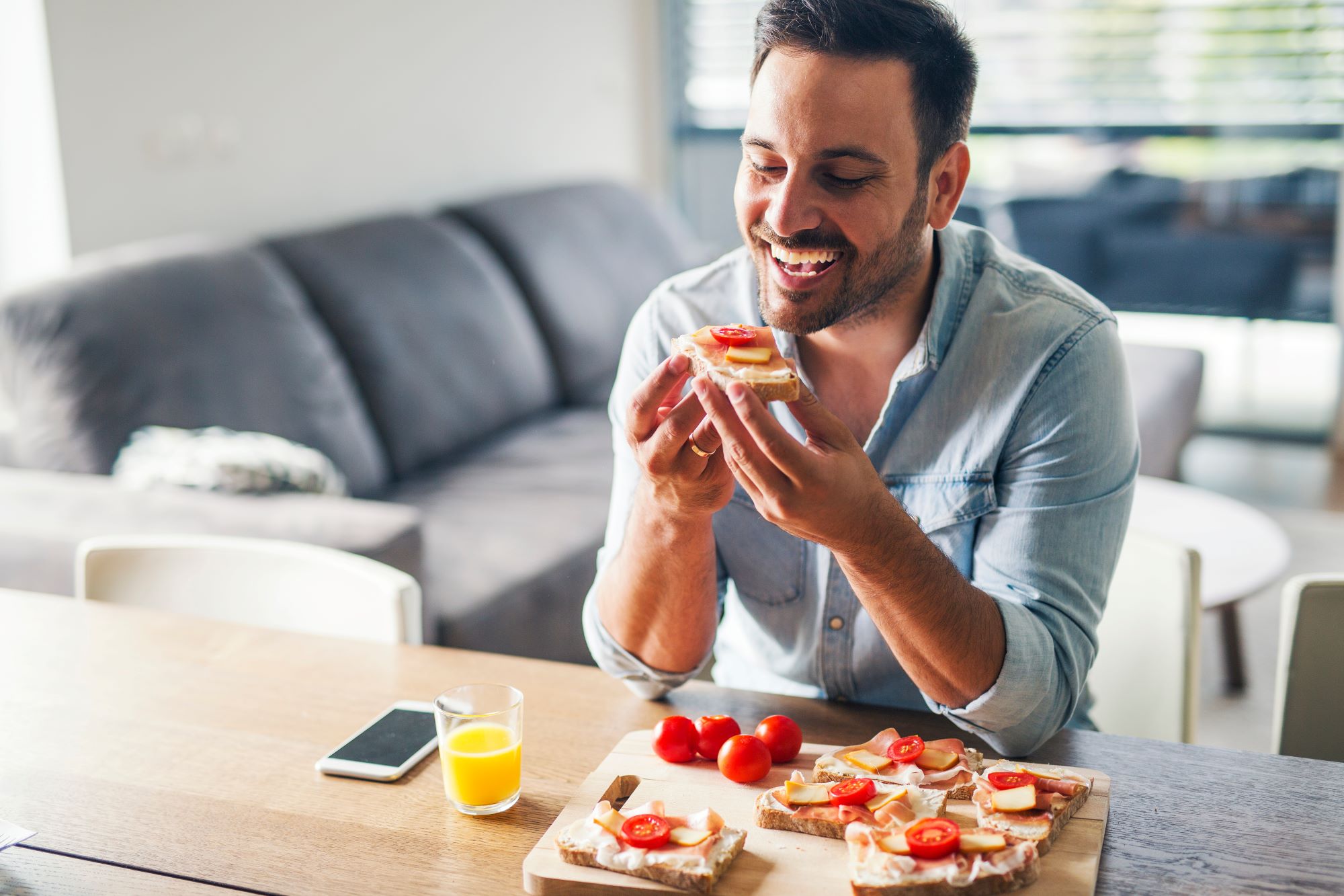man eating pizza