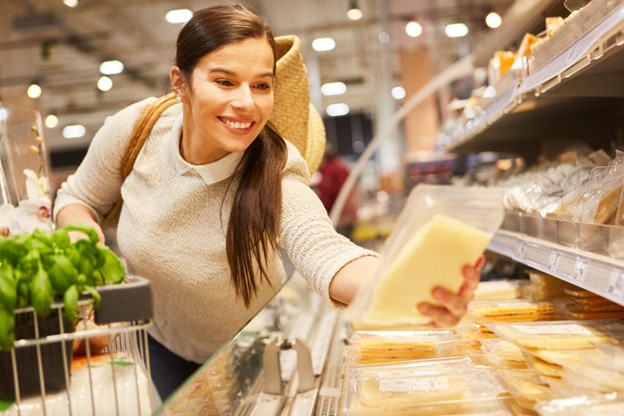 woman buying cheese