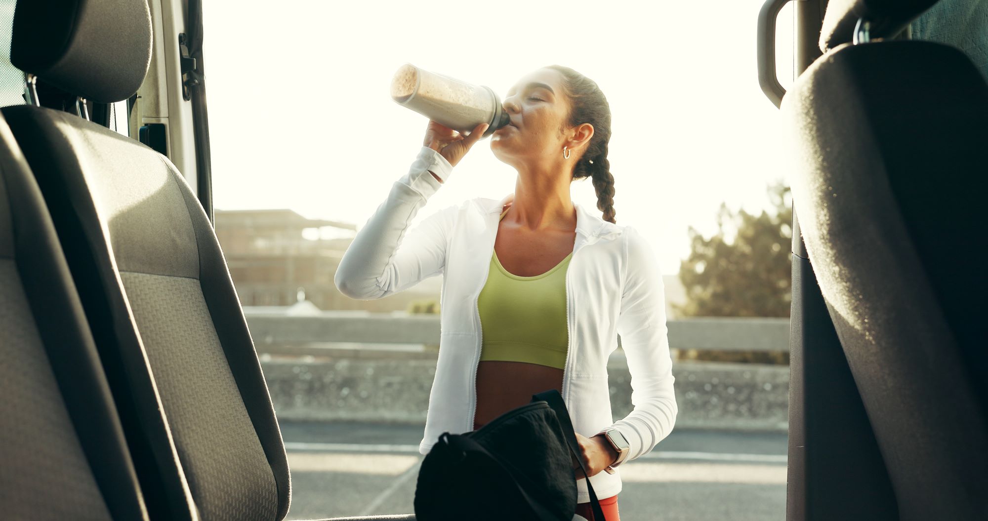 woman drinking protein shake
