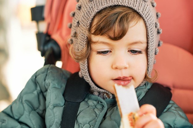 kid eating treat