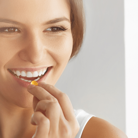 woman taking supplements