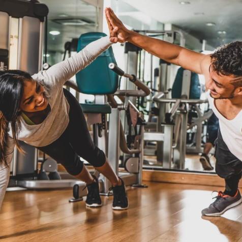 man and woman working out