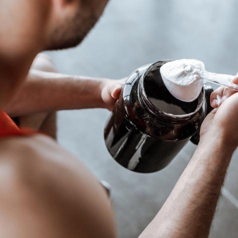 man with protein powder