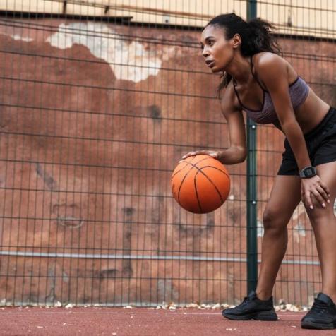 woman playing basketball