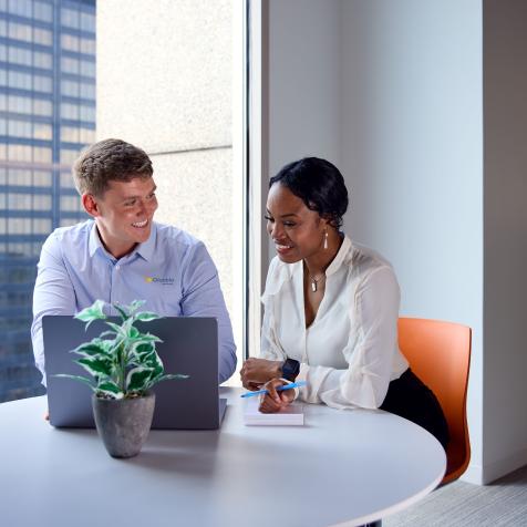 man and woman at computer