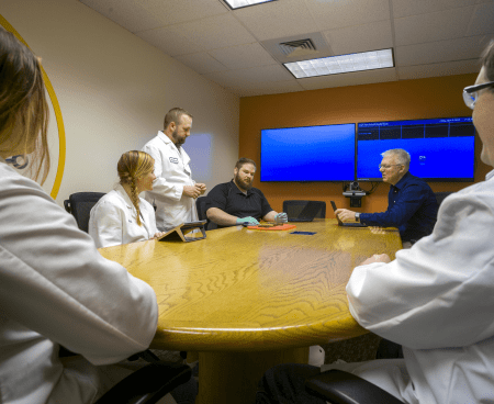 Scientists in conference room
