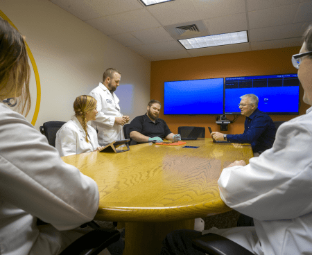 Scientists in conference room