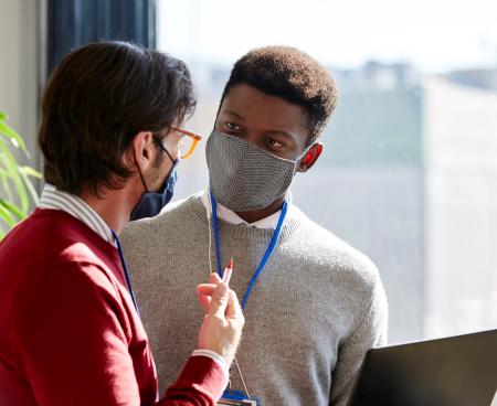man talking to other person