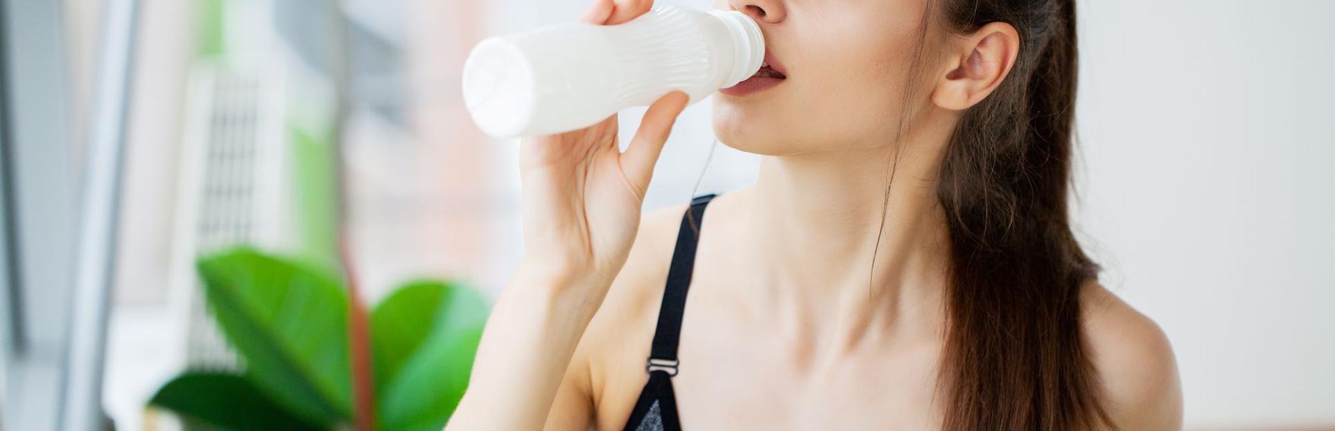 woman drinking beverage