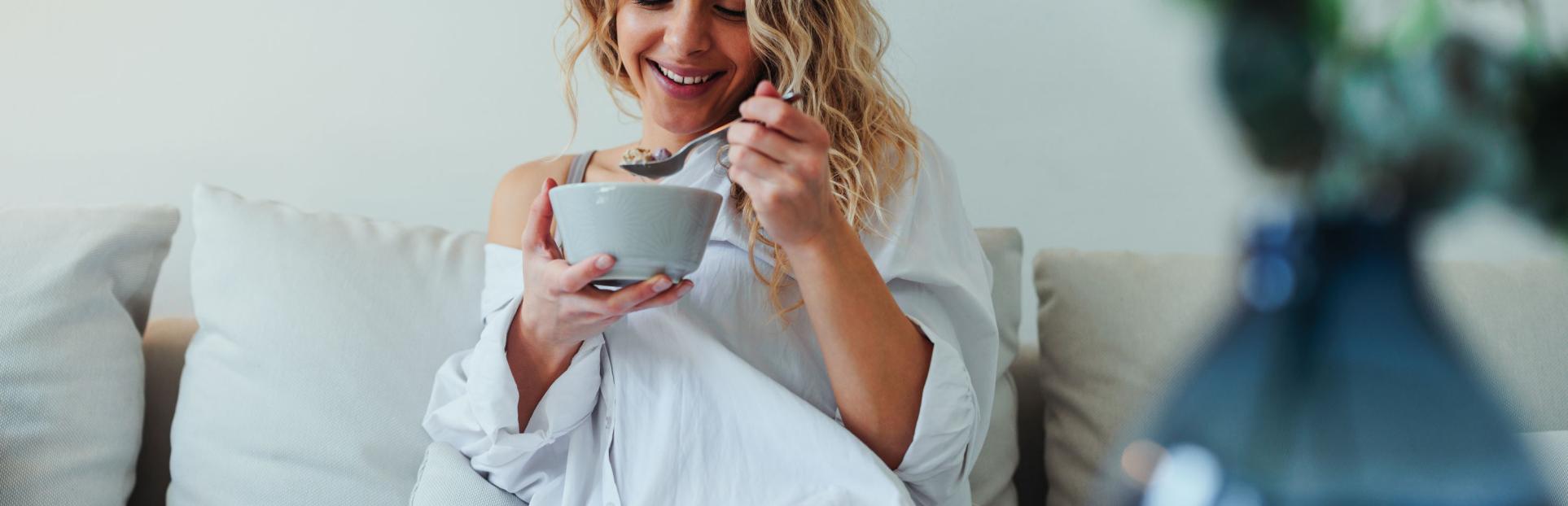 woman eating cereal