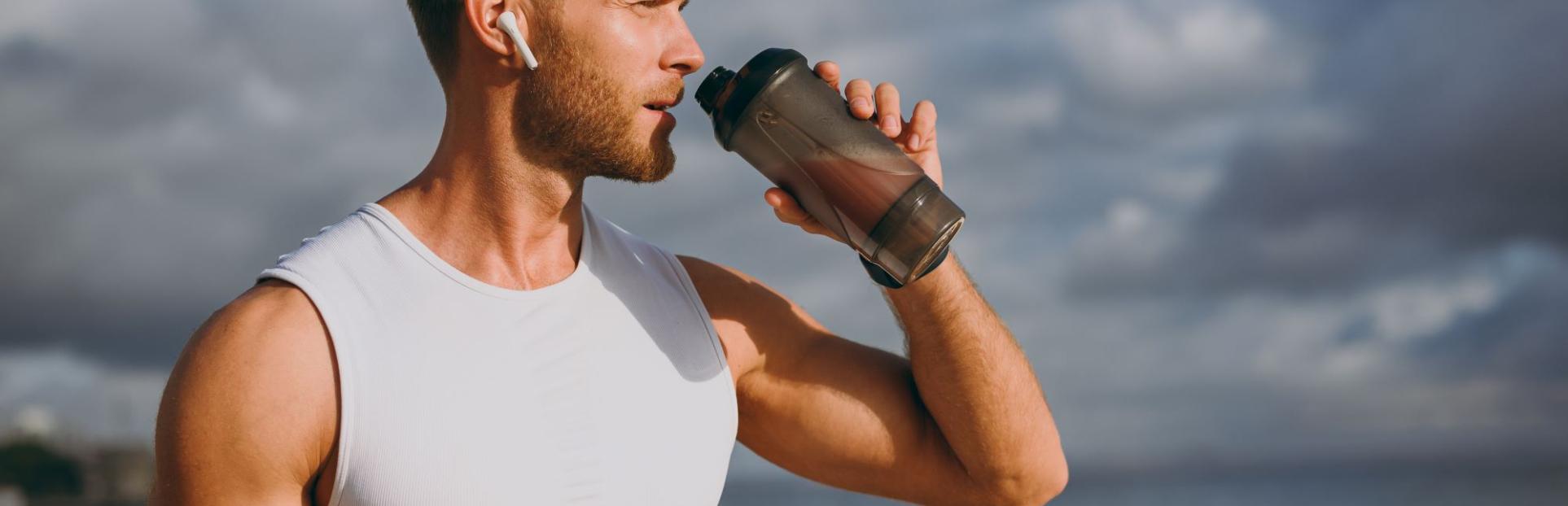 man drinking protein shake