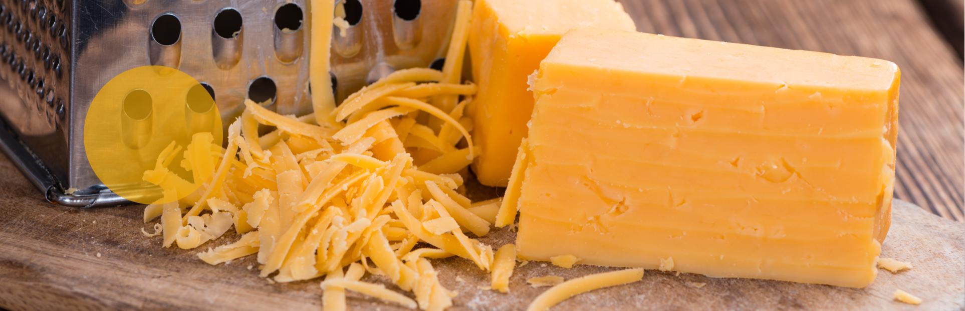 grated cheddar cheese and block of cheese