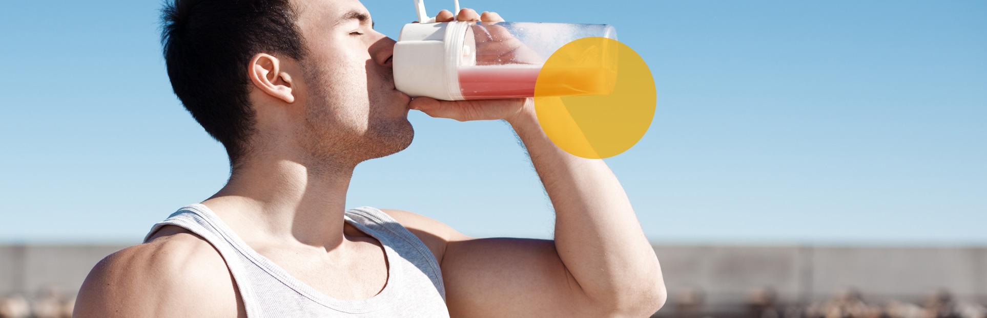 man drinking protein shake