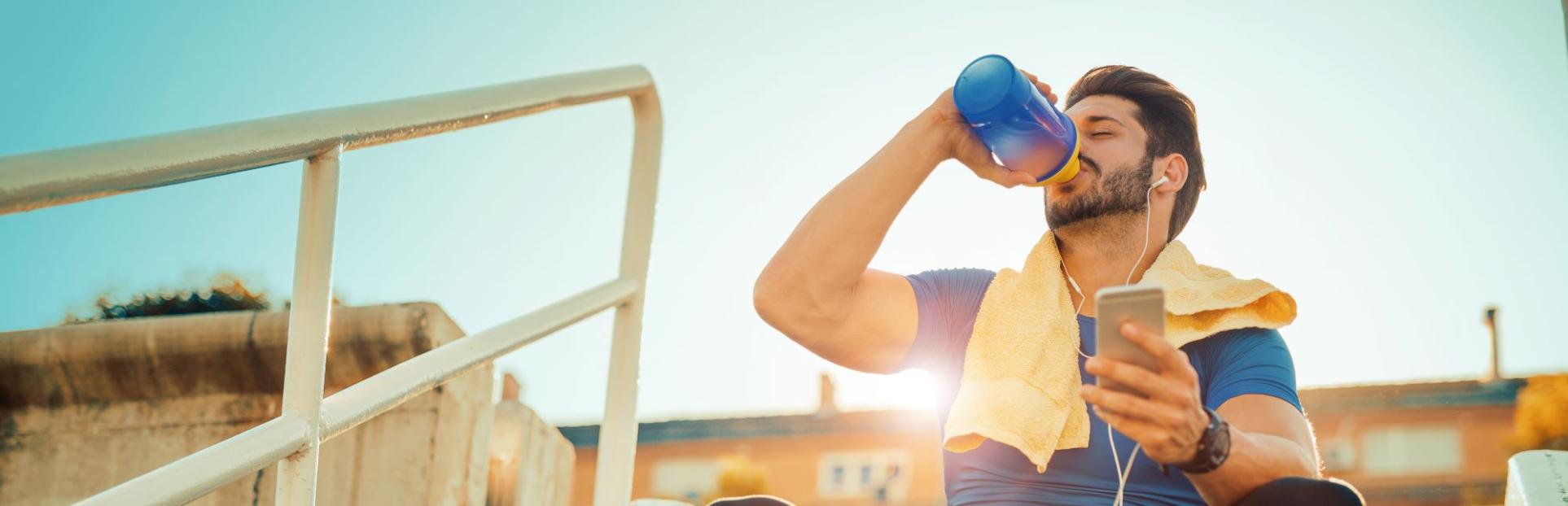man drinking protein shake